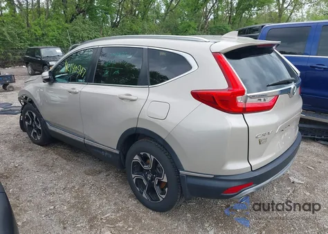 2019 Honda Cr-V Touring z USA, uszkodzony, nr VIN 2HKRW2H94KH623003